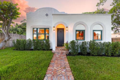 Near Galleries and Shops Spanish Revival WPB Home!