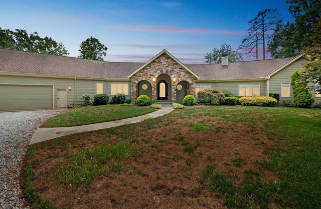 NEW LISTING! Hidden Waterfront Luxury Oasis with 9-Acre Pond by RedAwning