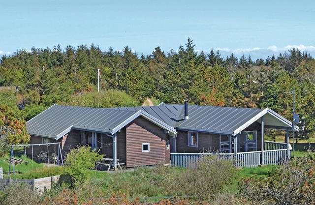 Nice home in Oksbøl with sauna