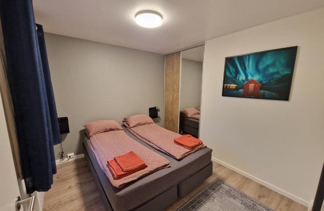 Northern living 1 room with shared bathroom