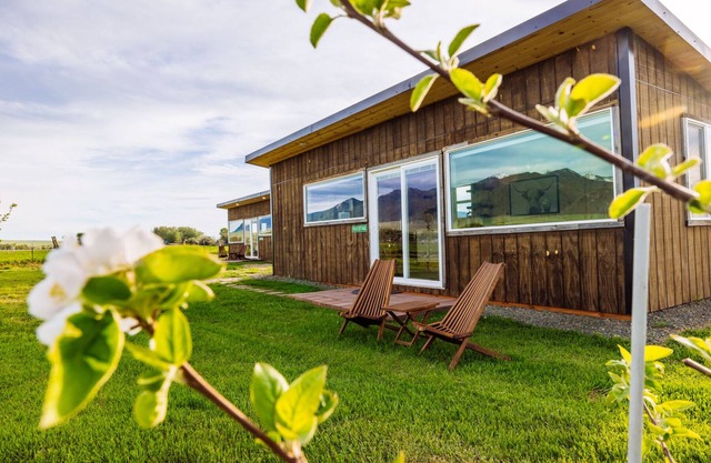 Off-grid tiny home in apple orchard with million-dollar mountain views!