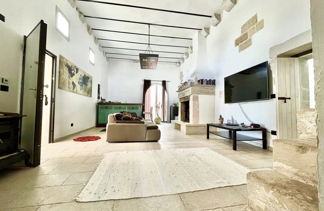 Old renovated millstone with jacuzzi