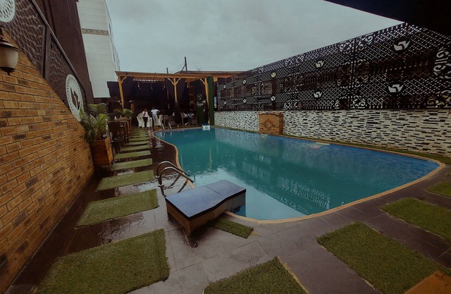 OLYMPUS HOTEL & SUITES