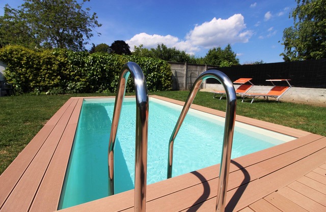 Overlooking Lake Orta. Plenty of room, private garden with pool