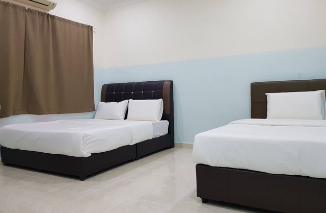 OYO 89998 thank Q inn 2