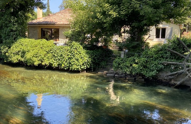 Paradise, relax by the river in peace with your feet in the water