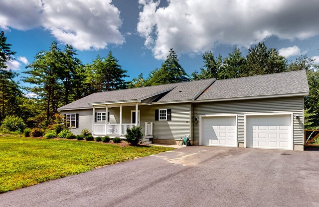 Peaceful lakefront home with kayaks, small dock, deck, & firepit - dog-friendly