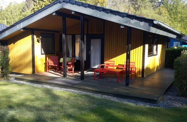 Pure relaxation right by the forest & only 750m to the beach in our retro chalet