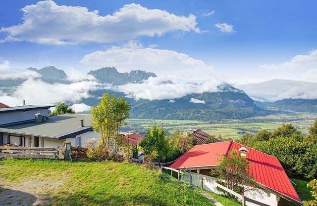 Quaint Chalet with Garden, Terrace, Fireplace,Play Equipment