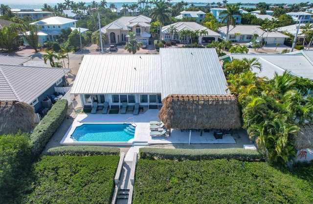 Reel 'Em In: Your Beautiful KCB Retreat, Private Pool, Dock, Tiki Hut, Cabana Club & Dog-Friendly!
