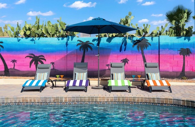 Relax by the pool at our Moon Valley Retreat, with games, outdoor grill and more