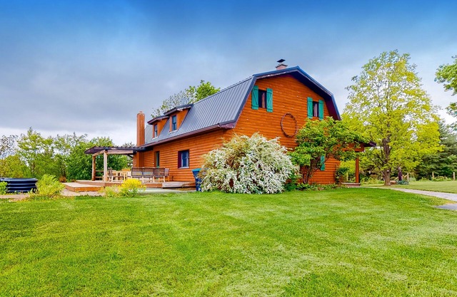 Relaxing dog-friendly water-view cabin with firepit, deck, grill, & full kitchen