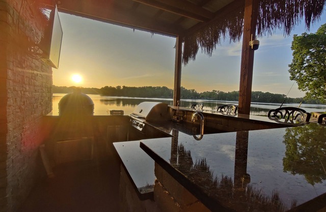 Relaxing lakeside retreat w/pool, hot tub, bars. Pet-friendly! One-of-a-kind!