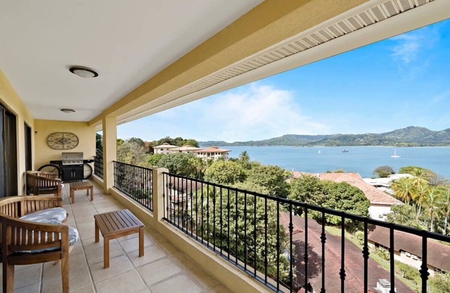 Remodeled Top-Floor Condo with Stunning Wrap-Around Balcony Offering Mountain, O
