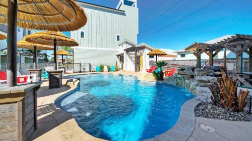 Resort Pool Walk to the Beach Island Views Little Beach House by AvantStay