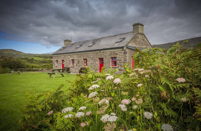 Restored 18C. Coastguard's Cottage on the shore of the beautiful Kenmare Estuary