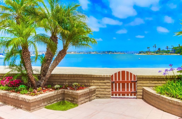 Right On The Beach! Exquisitely Remodeled 2BR/2BA . Perfect For Families.