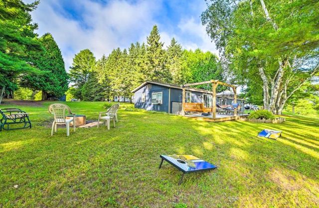 Riverfront Home with Dock about 6 Mi to Cheboygan!