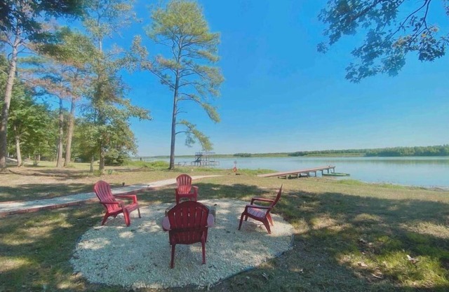 Riverfront home with hot tub, playground, kayaks, and amazing panoramic views!