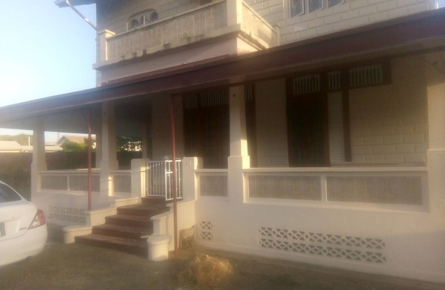 Robert's Guesthouse in Port of Spain.nIn the Heart of Carnival 2026
