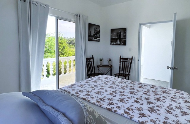 Room w/ocean view balcony next to the beach. 2 pools, fire pit, gardens & more!
