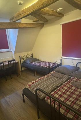 Rose Boardinghouse Zimmer mit Gemeinschaftsbad