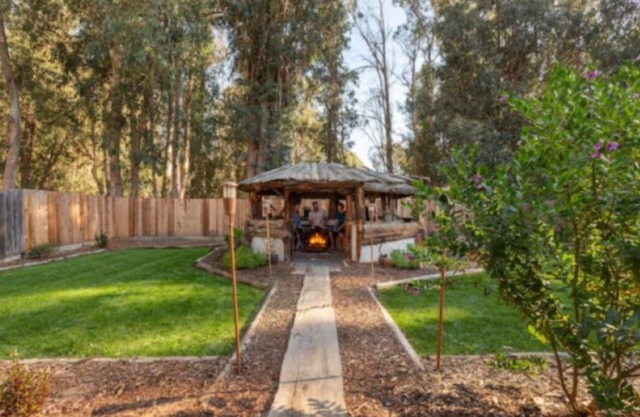 Sanitized Country home with backyard tiki hut and firepit