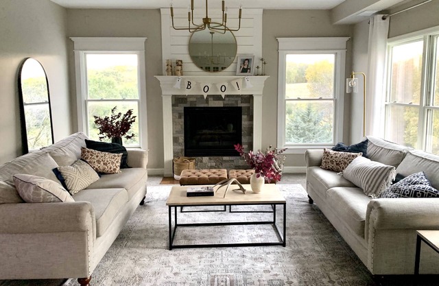 Secluded, spacious, hilltop acreage home with stunning views of Omaha skyline