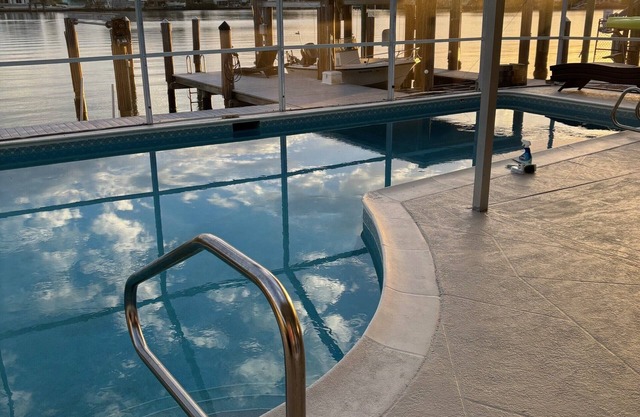 See dolphins and beautiful sunsets at this newly remodeled Isles of Capri Home.