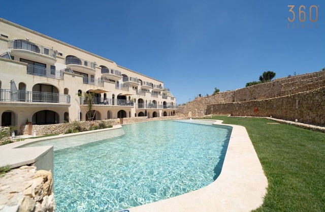 Serene Apt with Terrace & Pool & BBQ Access,Qala