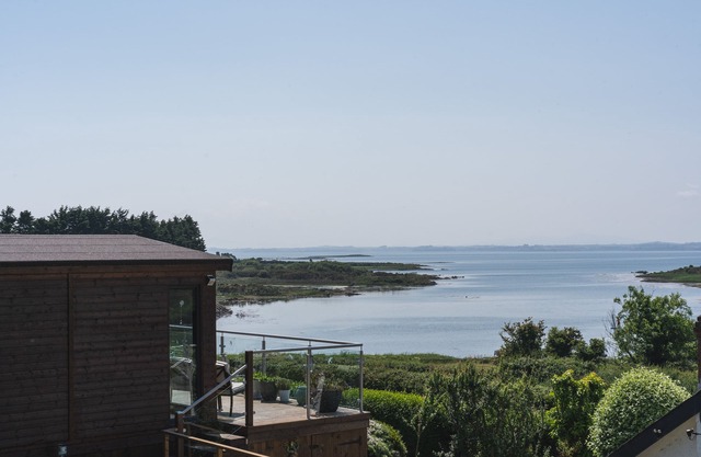 Set on an elevated private site with commanding views over Strangford Lough.