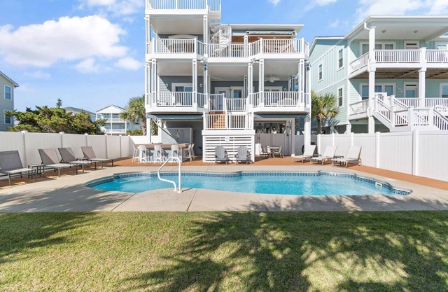 "Shrimply The Best" is better than all the rest! This gorgeous property features 5 Bedrooms, 5.5 Bathrooms, private Saltwater pool, Tiki Bar, and Elevator.