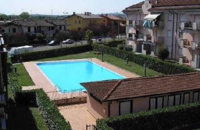 Sirmione near the thermal baths apartment in a residence with swimming pool