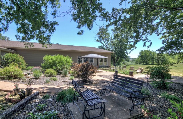 Spacious 10-bedroom, 40 beds, 3.5 bath country home in Osseo, WI with WiFi, AC