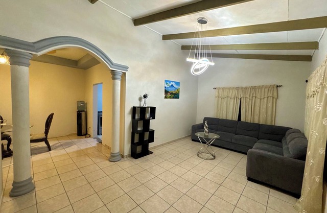Spacious 4-bedroom house with WiFi and AC in vibrant San Pedro Sula