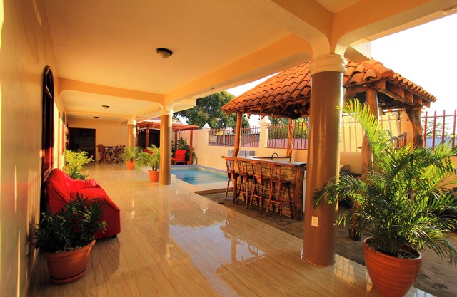 Spacious 5-bedroom house in vibrant San Juan del Sur; WiFi, AC, Pool, Sports bar