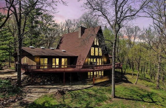 Spacious A-Frame sleeps 25 on 5 wooded acres with a private fishing pond