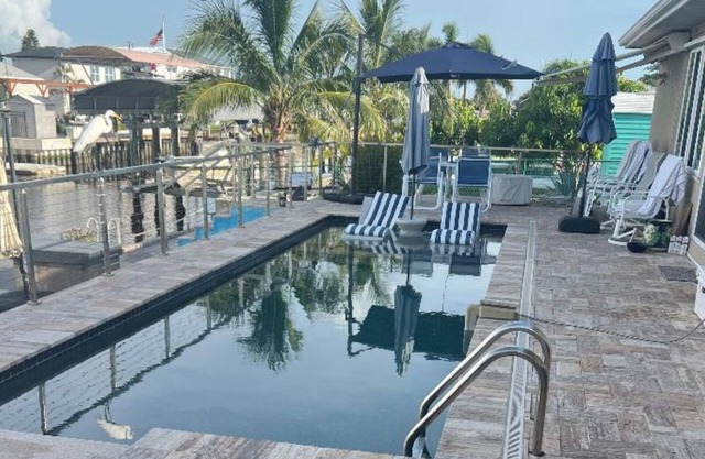 Spacious Ellenton Escape – 3 Bedrooms, Pool, Dock with Boat Slip & Full AC