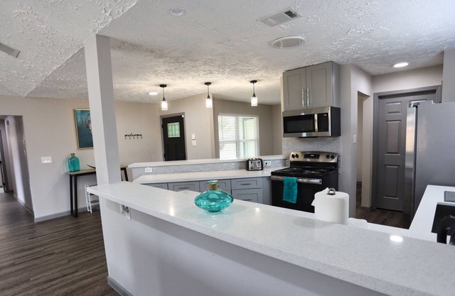 Spacious Home + Quiet Nbhd w/ Parking & Queen Beds + Central Location
