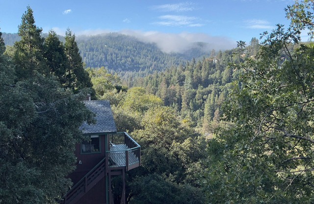 Spacious home with modern finishes, beautiful views, 2 decks & fireplace