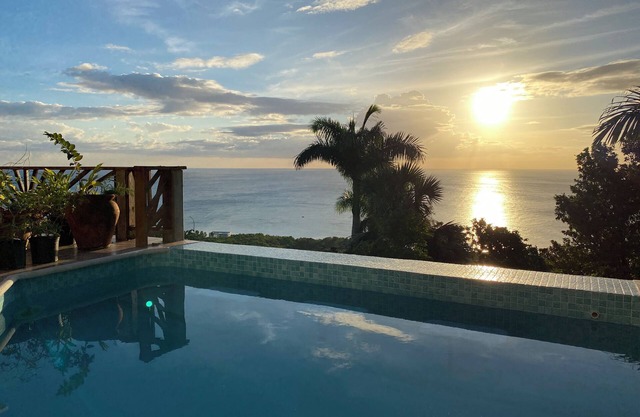 Spacious luxury villa in Whitehouse, Jamaica, with expansive ocean views.
