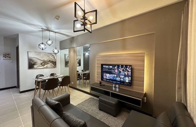 Spacious Resort-Type 2 bedroom condo unit w/parking near Airport - 15 mins away
