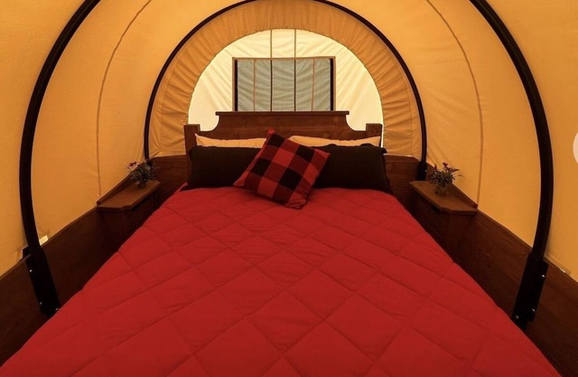 Stay in a unique Conestoga Wagon with room for 4