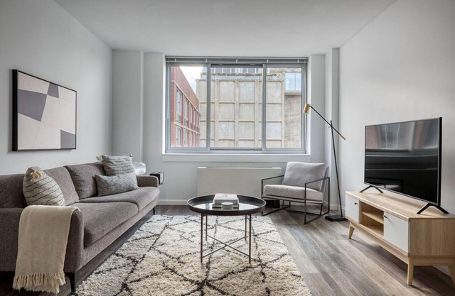 Stellar LES 2BR w/Doorman, W/D & Gym, nr Park, by Blueground