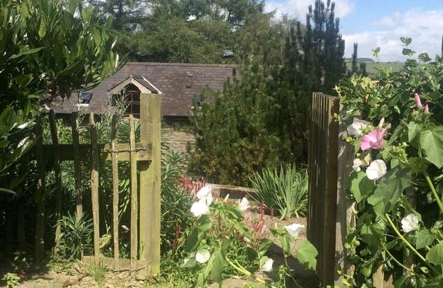 Stone Barn conversion on old traditional hill farm with wood-fired hot tub