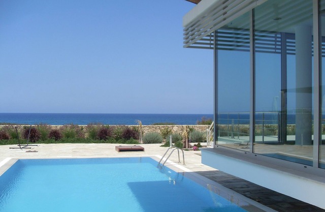 Stunning New Hi Spec Glass Fronted Villa Zero to the Sea