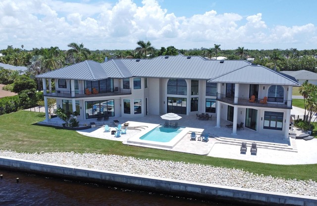 Stunning S. Fort Myers Riverfront Home With Unforgettable Sunsets! 2 Primary Suites! Heated Pool!