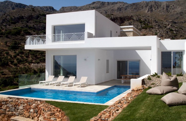 Stylish and contemporary 3 bedroom villa, with large pool, sea views + fast wifi