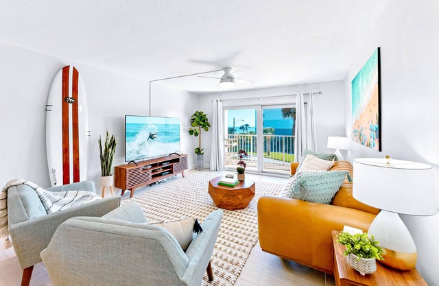 Stylish Beachfront Condo – Balcony, Heated Pool & Steps to Pier