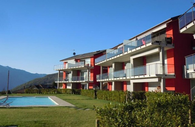 Stylishly furnished apartment in a residence with pool and dream view